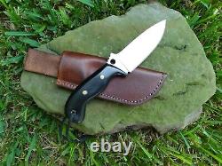 Hand made knives with leather sheath made with pride one at a time in the USA