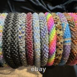 Sashka Co. Lot of 44 Assorted Colors Hand Made Glass Beaded 8Bracelets withHolder