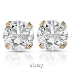Boucles d'oreilles en diamants naturels ronds, poids total de 1,05 carat, en or jaune 14 carats, à 6000 dollars.