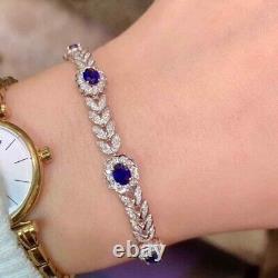 Bracelet de tennis pour femmes en saphir bleu taillé ovale de 8,00 Ct finition en or blanc 14 carats