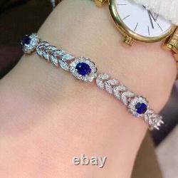 Bracelet de tennis pour femmes en saphir bleu taillé ovale de 8,00 Ct finition en or blanc 14 carats