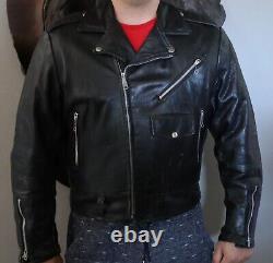 Veste de motard en cuir noir des années 1950 en peau de vache rétro vintage, lourde en très bon état.